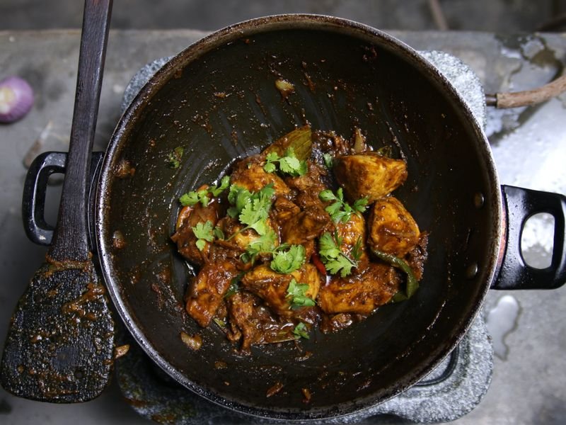 A pan of curry cooking