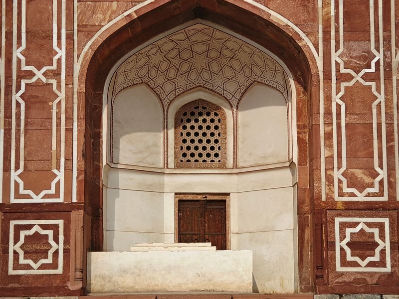 The inlaid stone facade of a Mughal tomb