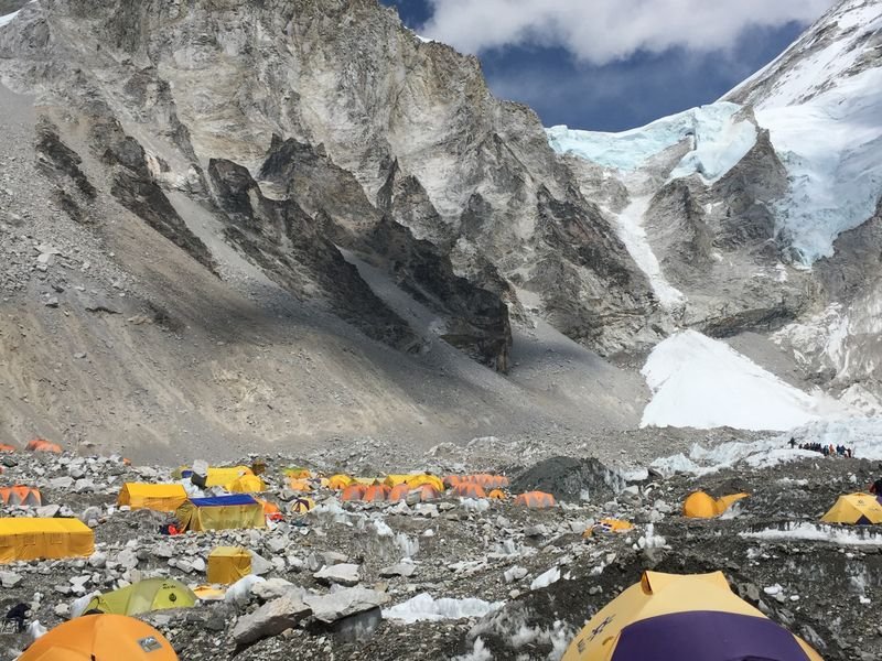 A high mountain camp below bare peaks