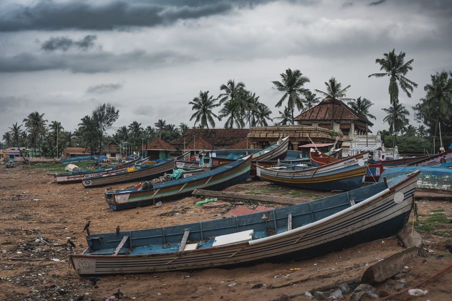 Wooden fishing boats drawn up on the beach