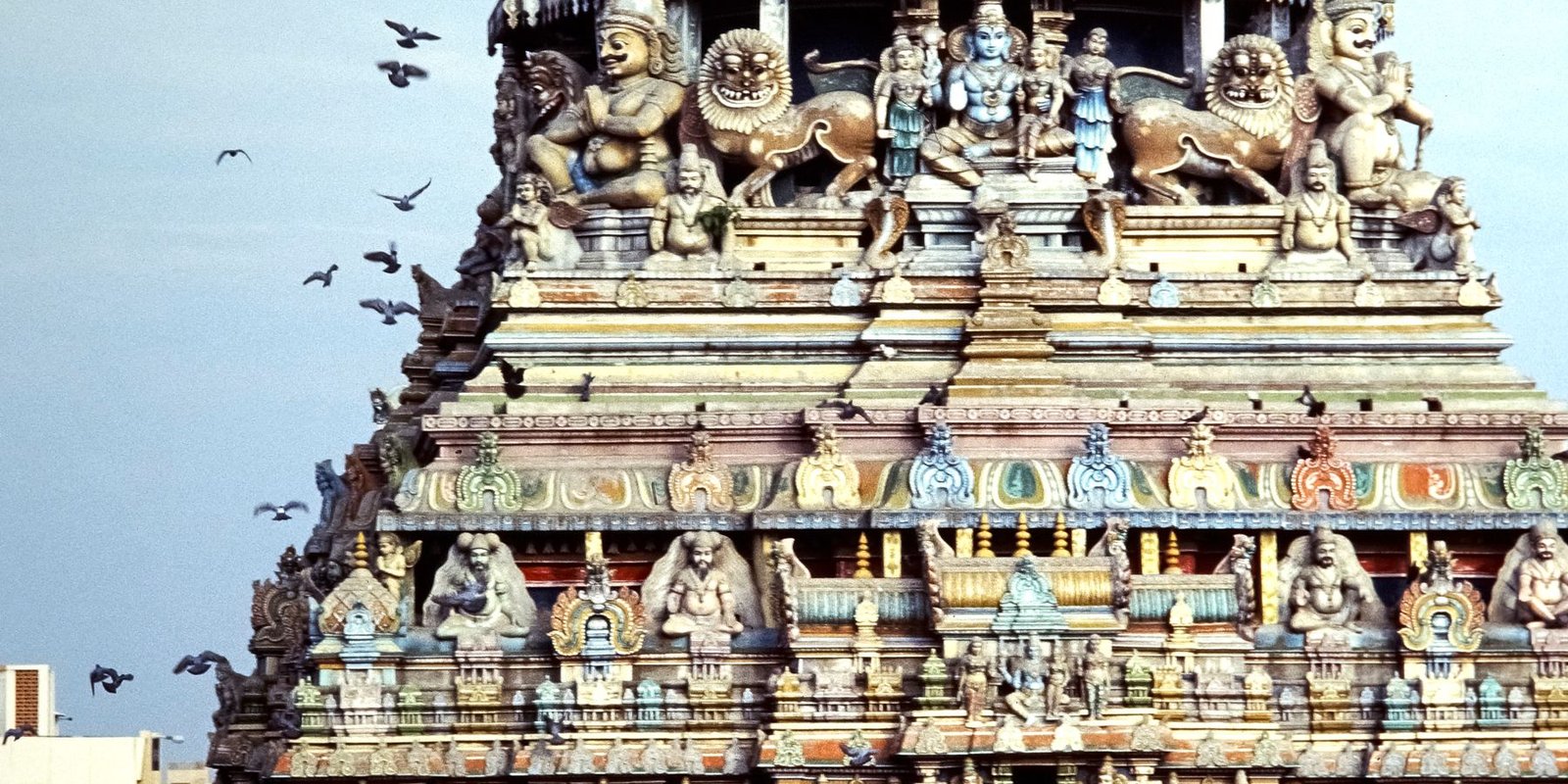 A South Indian temple gateway carved with painted figures