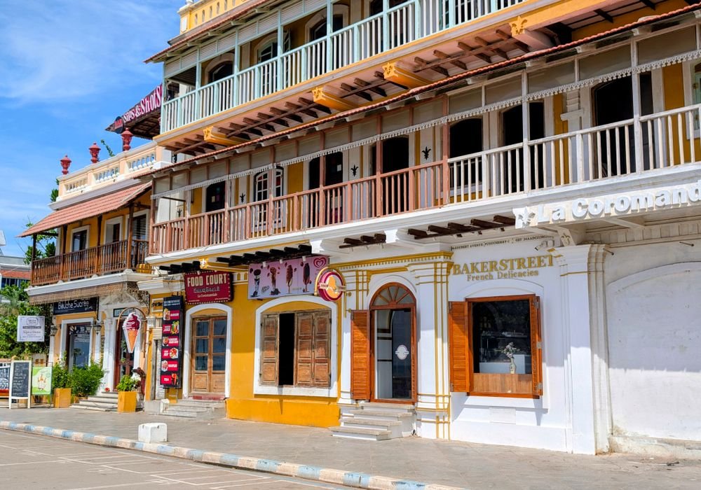 A colonial-era street of shuttered balconies at Pondicherry